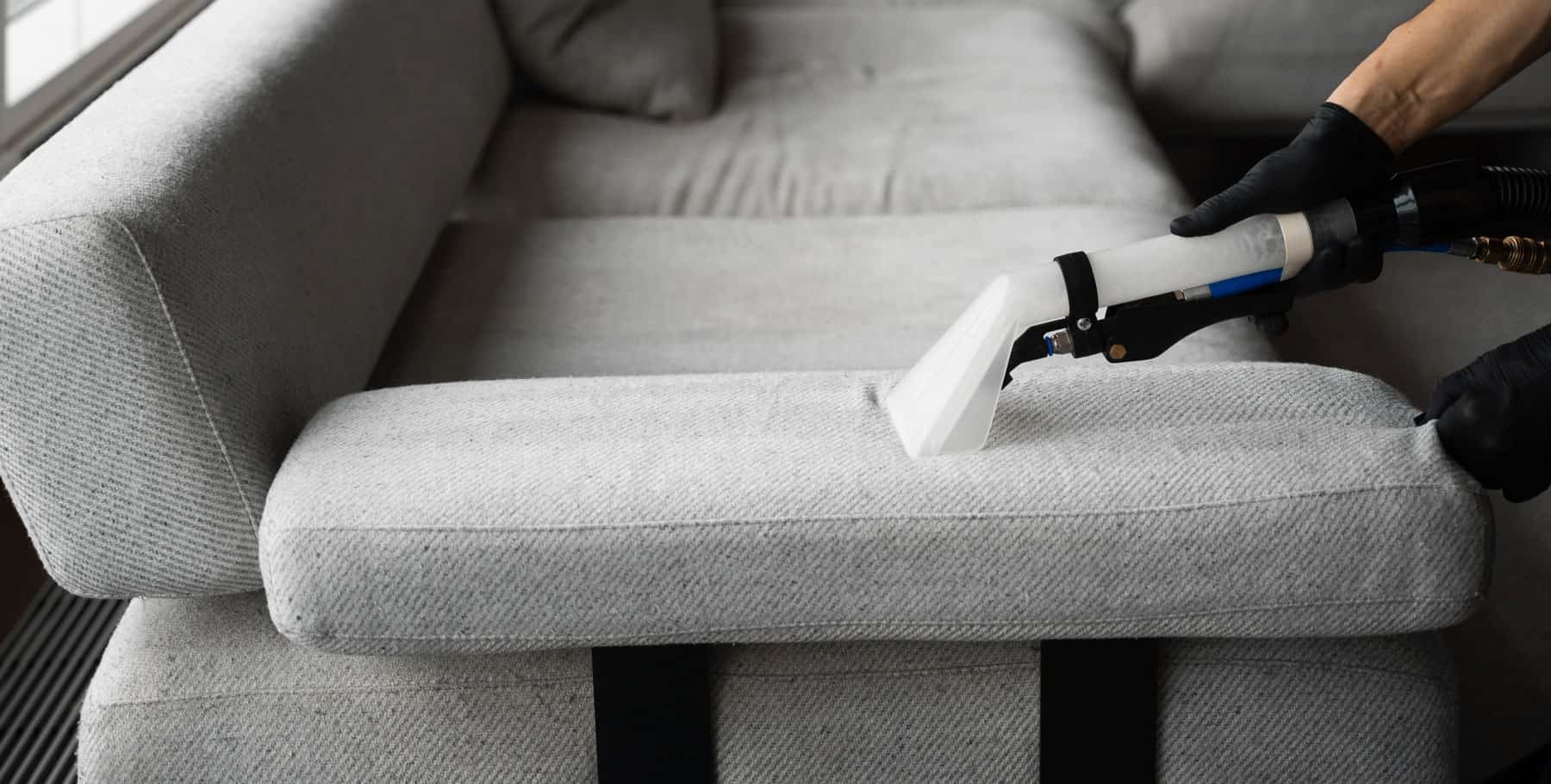 Upholstery being professionally cleaned